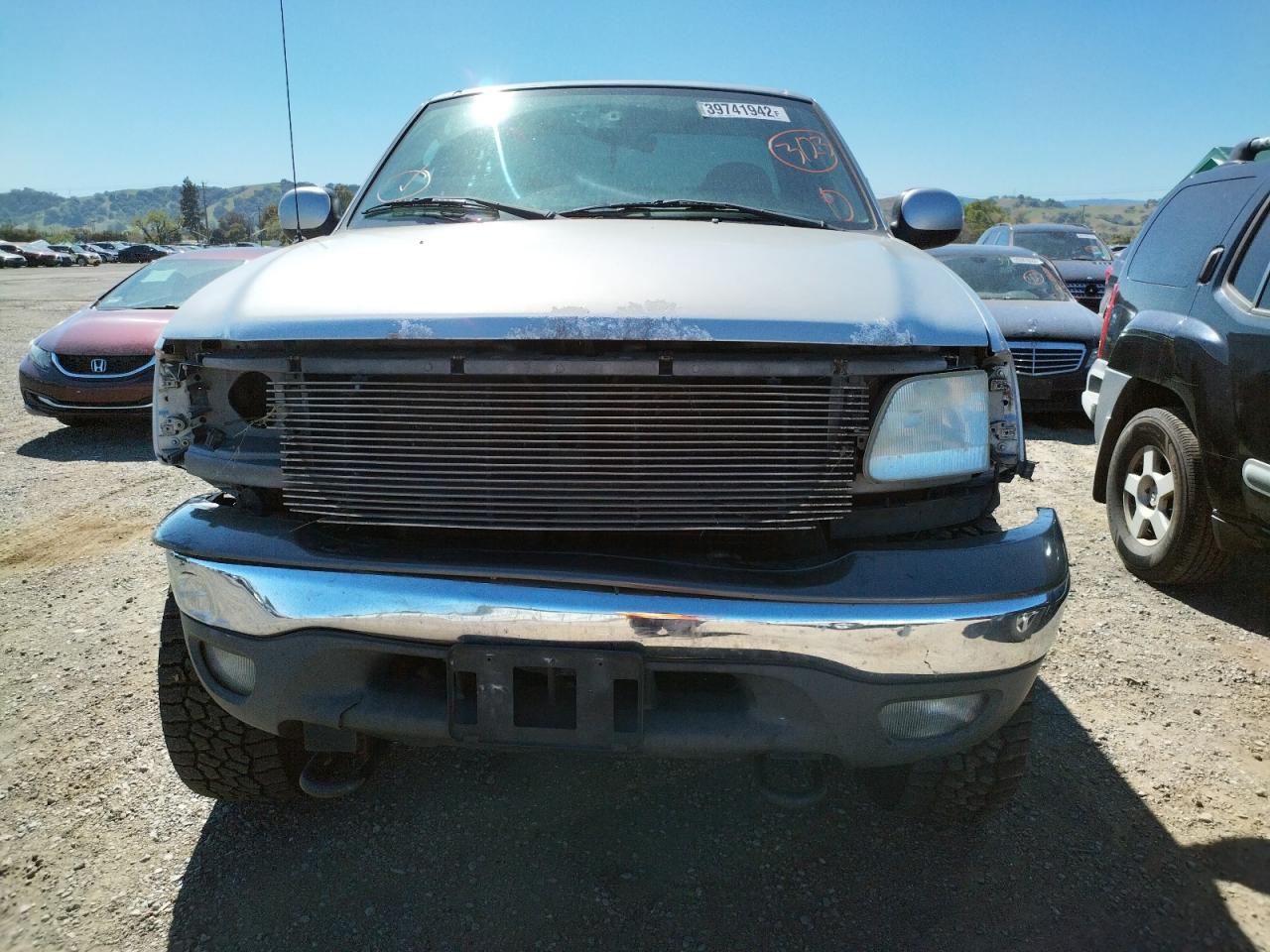 Photo 9 from auction – 2003 FORD F150 with VIN 1FTRF18L33NA90715