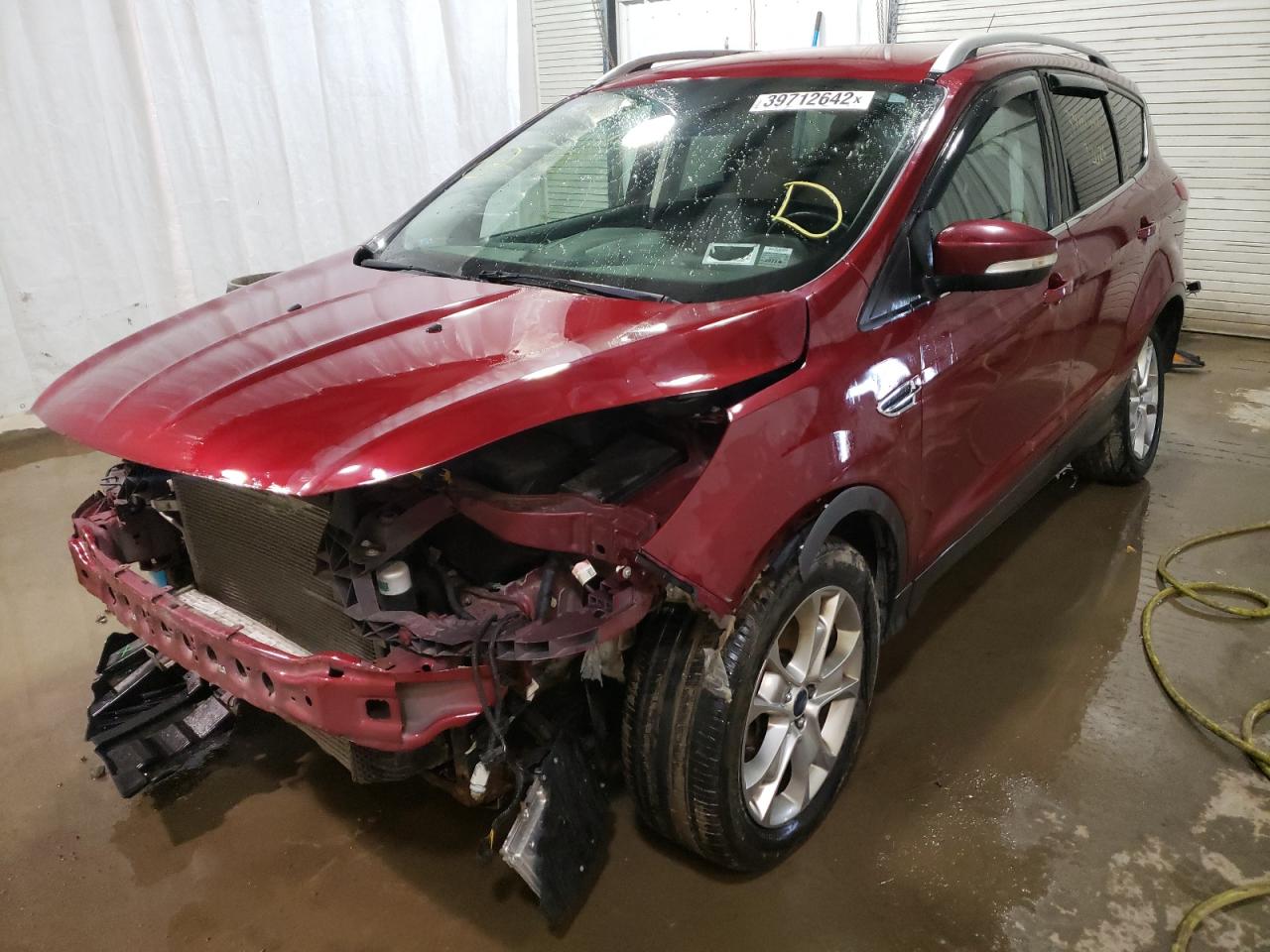 Photo 2 from auction – 2015 FORD ESCAPE TIT with VIN 1FMCU9J99FUC19359