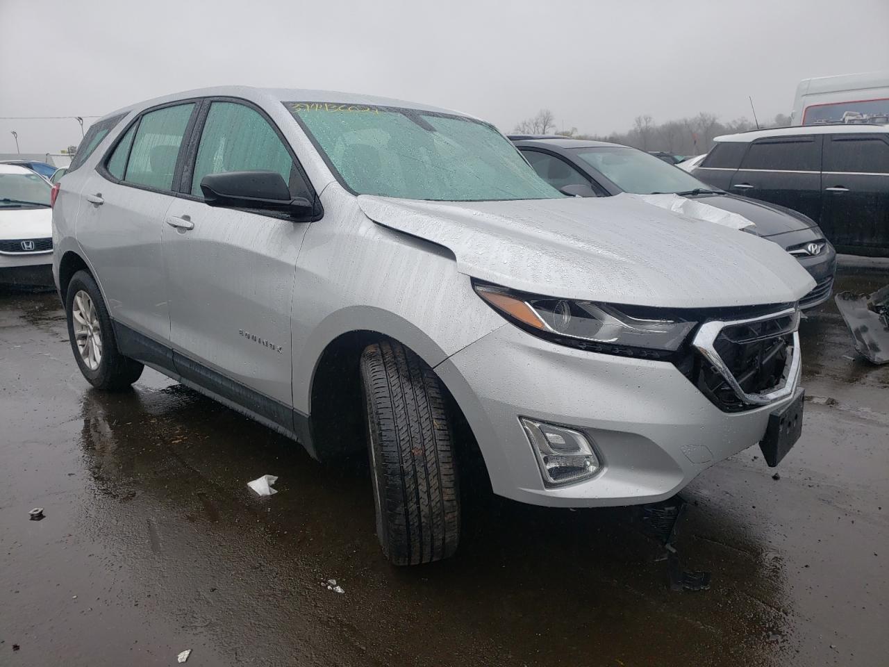 CHEVROLET EQUINOX LS 2018 with VIN 3GNAXREV8JS569219 - Photo from auction