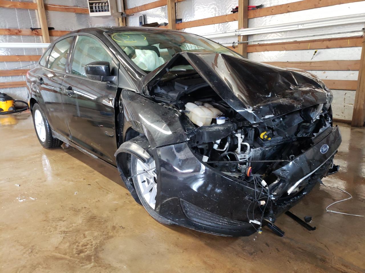 FORD FOCUS SE 2018 with VIN 1FADP3F21JL239151 - Photo from auction