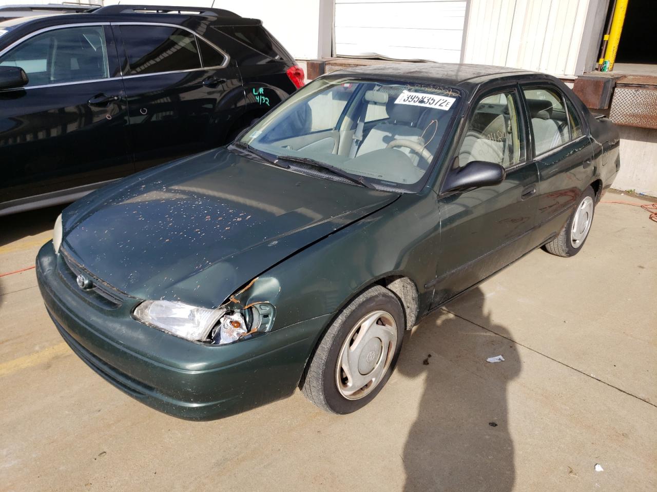 Foto 2 de la subasta – 2000 TOYOTA COROLLA VE con VIN 2T1BR12E6YC299721