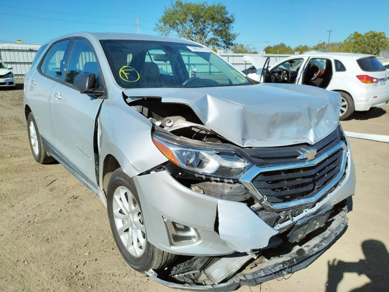 CHEVROLET EQUINOX LS 2018 with VIN 2GNAXHEV2J6121518 - Photo from auction