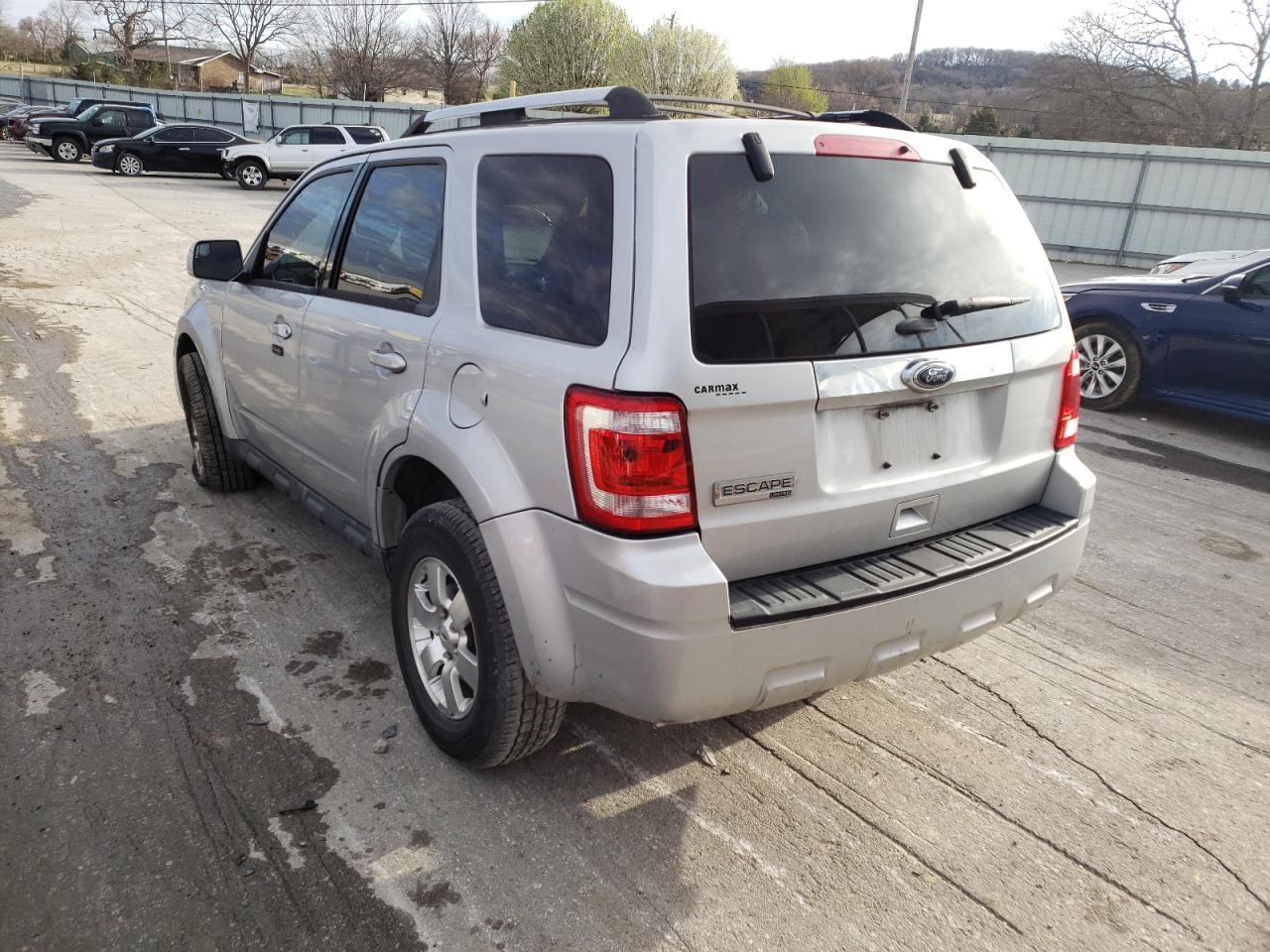 Photo 3 from auction – 2011 FORD ESCAPE LIM with VIN 1FMCU0E74BKB53894