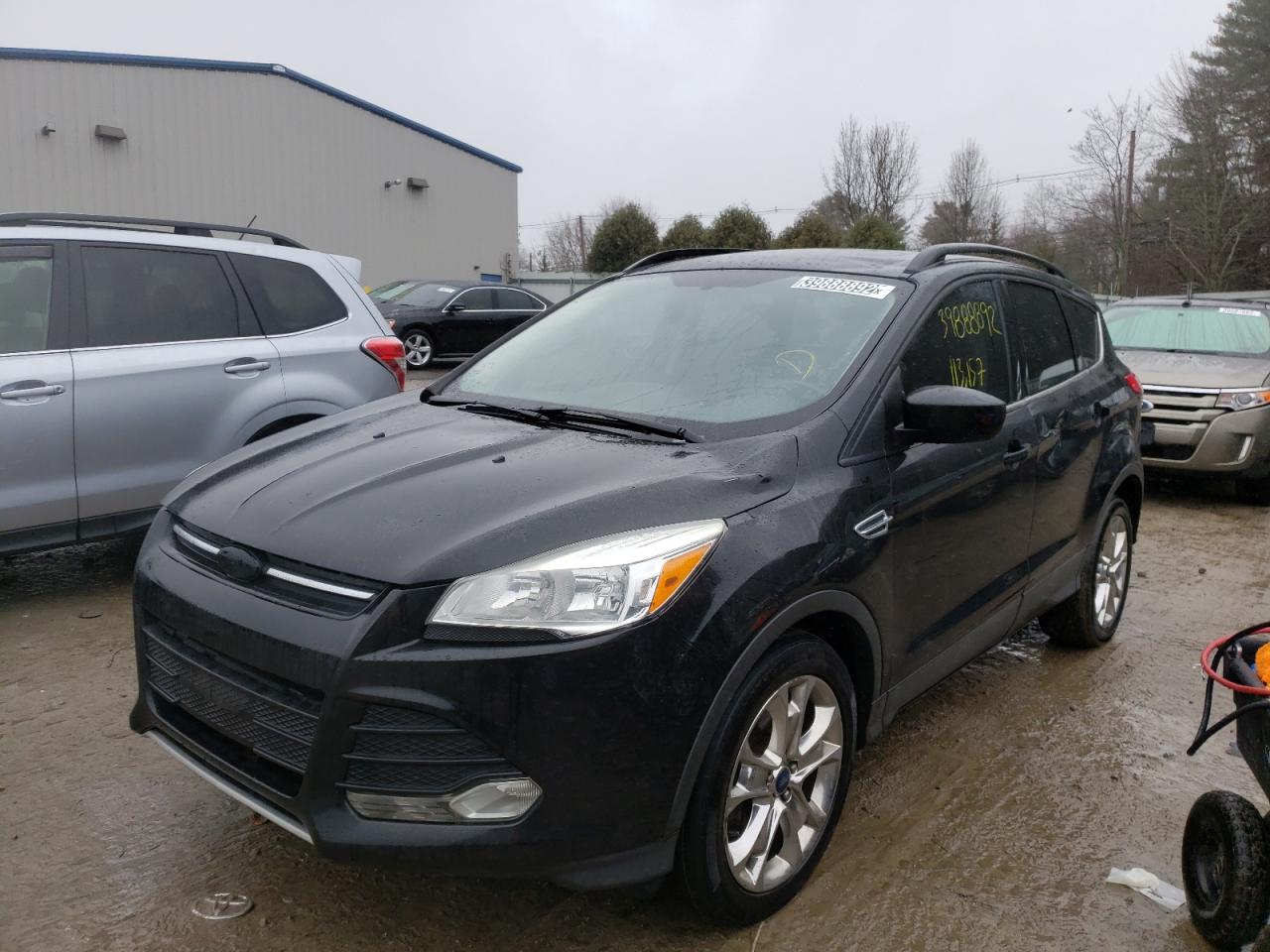 Photo 2 from auction – 2014 FORD ESCAPE SE with VIN 1FMCU9G96EUE31450