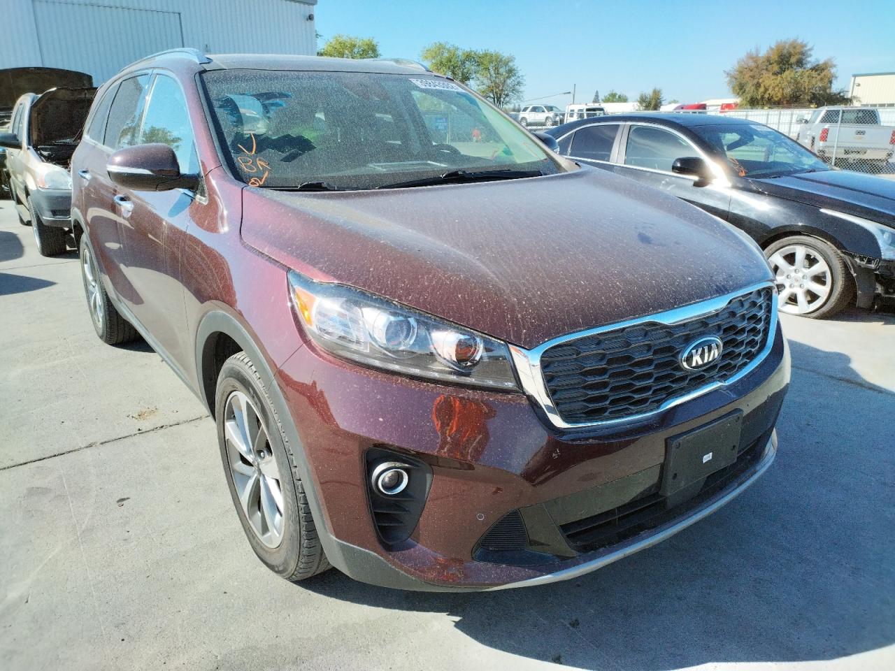 KIA SORENTO EX 2019 with VIN 5XYPH4A54KG475463 - Photo from auction