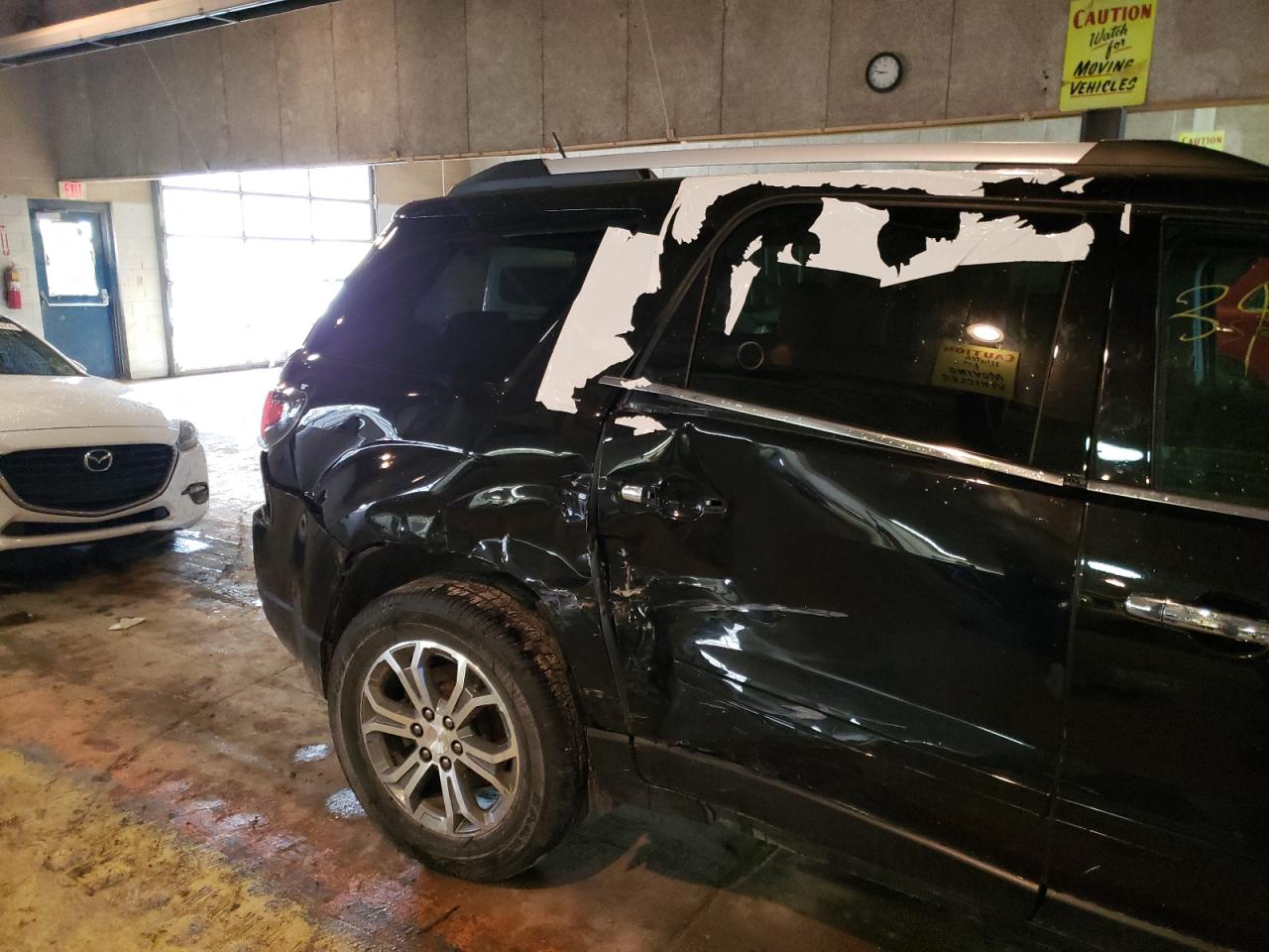 Photo 9 from auction – 2016 GMC ACADIA SLT with VIN 1GKKVRKD2GJ261217