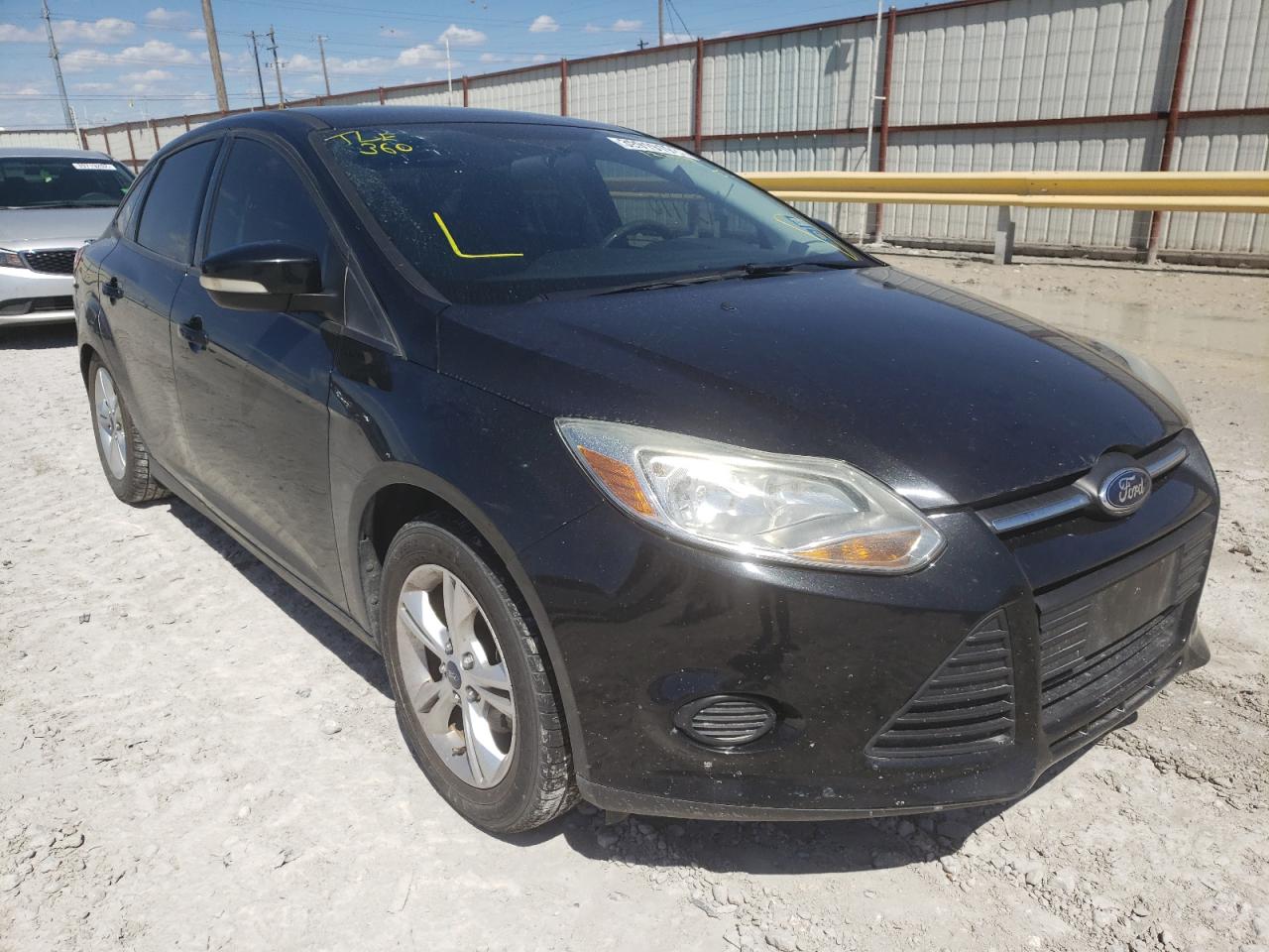 FORD FOCUS SE 2014 with VIN 1FADP3F22EL137539 - Photo from auction