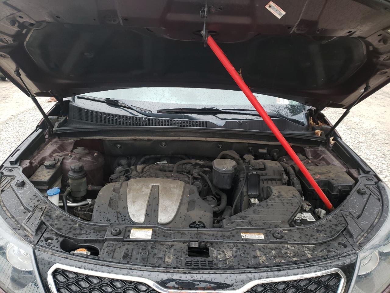 Photo 7 from auction – 2012 KIA SORENTO SX with VIN 5XYKWDA20CG307391