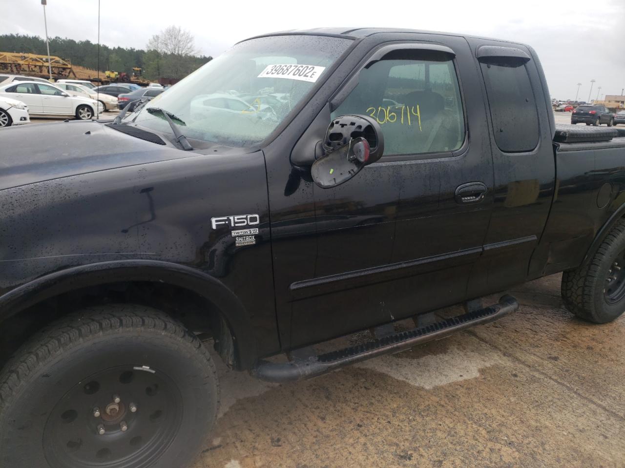 Photo 9 from auction – 2001 FORD F150 with VIN 1FTRX18L41NB75816