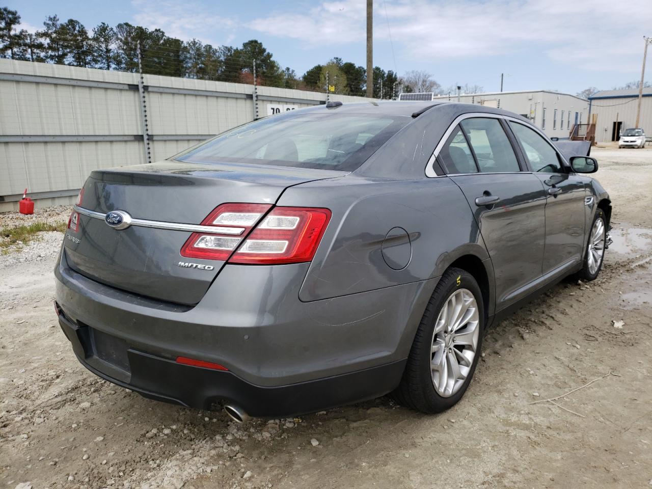 Photo 4 from auction – 2014 FORD TAURUS LIM with VIN 1FAHP2F84EG176593