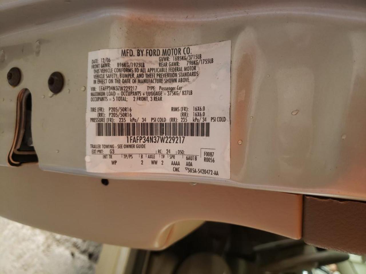 Photo 10 from auction – 2007 FORD FOCUS ZX4 with VIN 1FAFP34N37W229217
