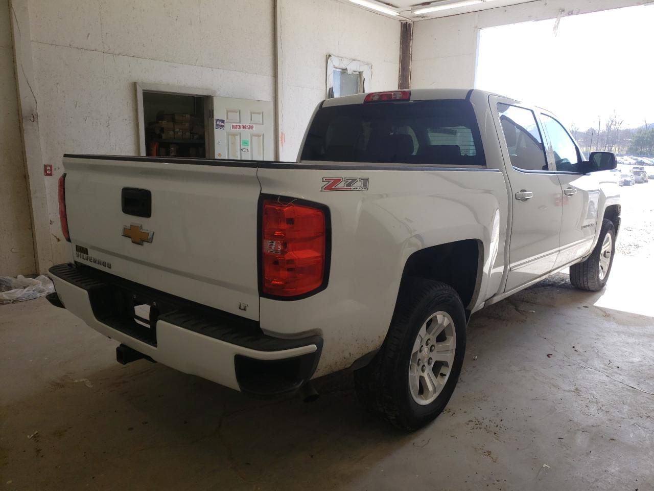 Photo 4 from auction – 2017 CHEVROLET SILVERADO with VIN 3GCUKREC9HG323344