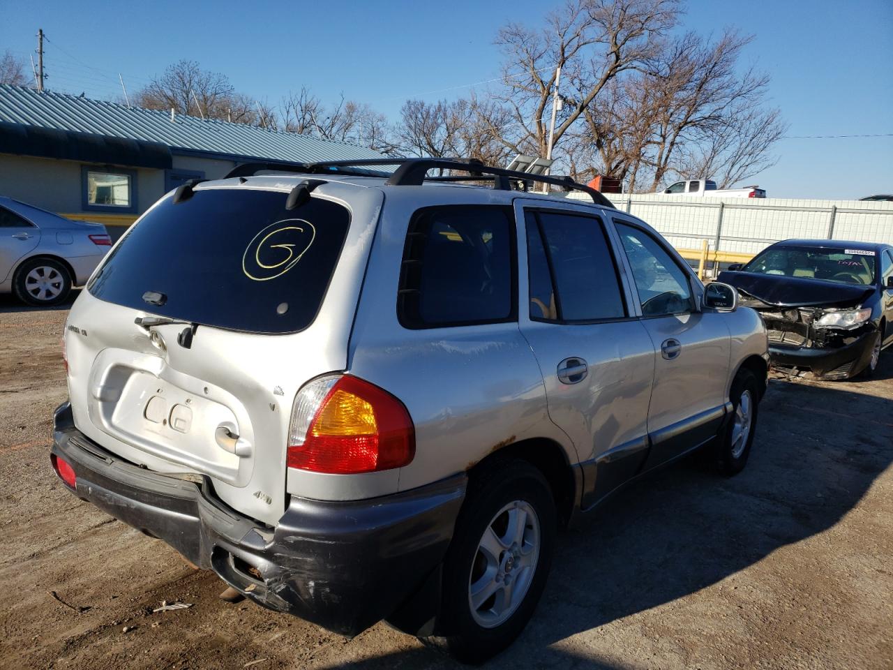 Photo 4 from auction – 2002 HYUNDAI SANTA FE with VIN KM8SC73D52U324690