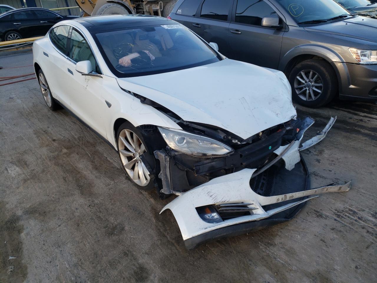 TESLA MODEL S 2012 with VIN 5YJSA1DP0CFS00739 - Photo from auction
