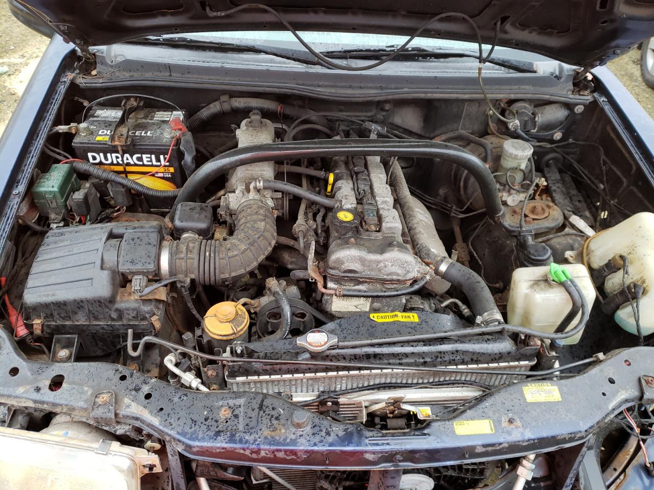 Photo 7 from auction – 2001 CHEVROLET TRACKER with VIN 2CNBJ13C516920244