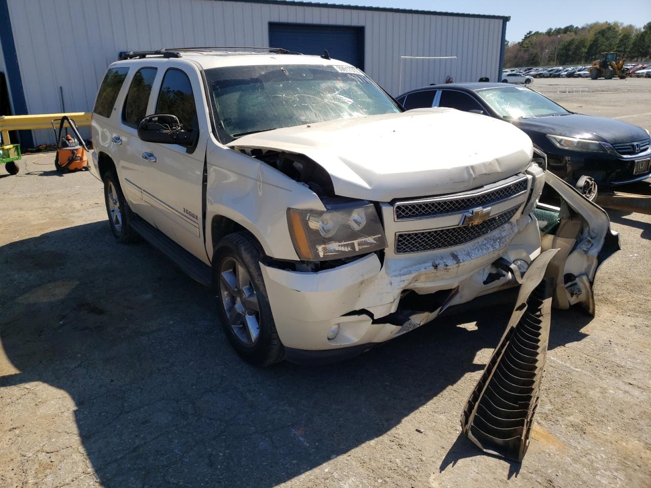 CHEVROLET TAHOE C150 2011 with VIN 1GNSCCE01BR371779 - Photo from auction