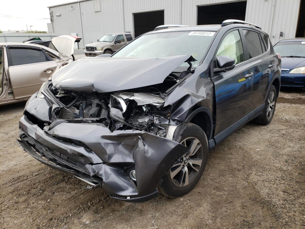 Photo 2 from auction – 2016 TOYOTA RAV4 XLE with VIN JTMWFREV2GD091843