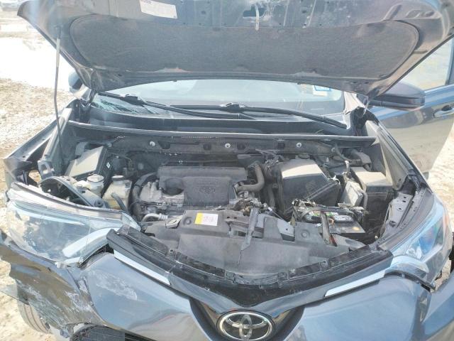 Photo 7 from auction – 2017 TOYOTA RAV4 LE with VIN JTMZFREV3HJ143299