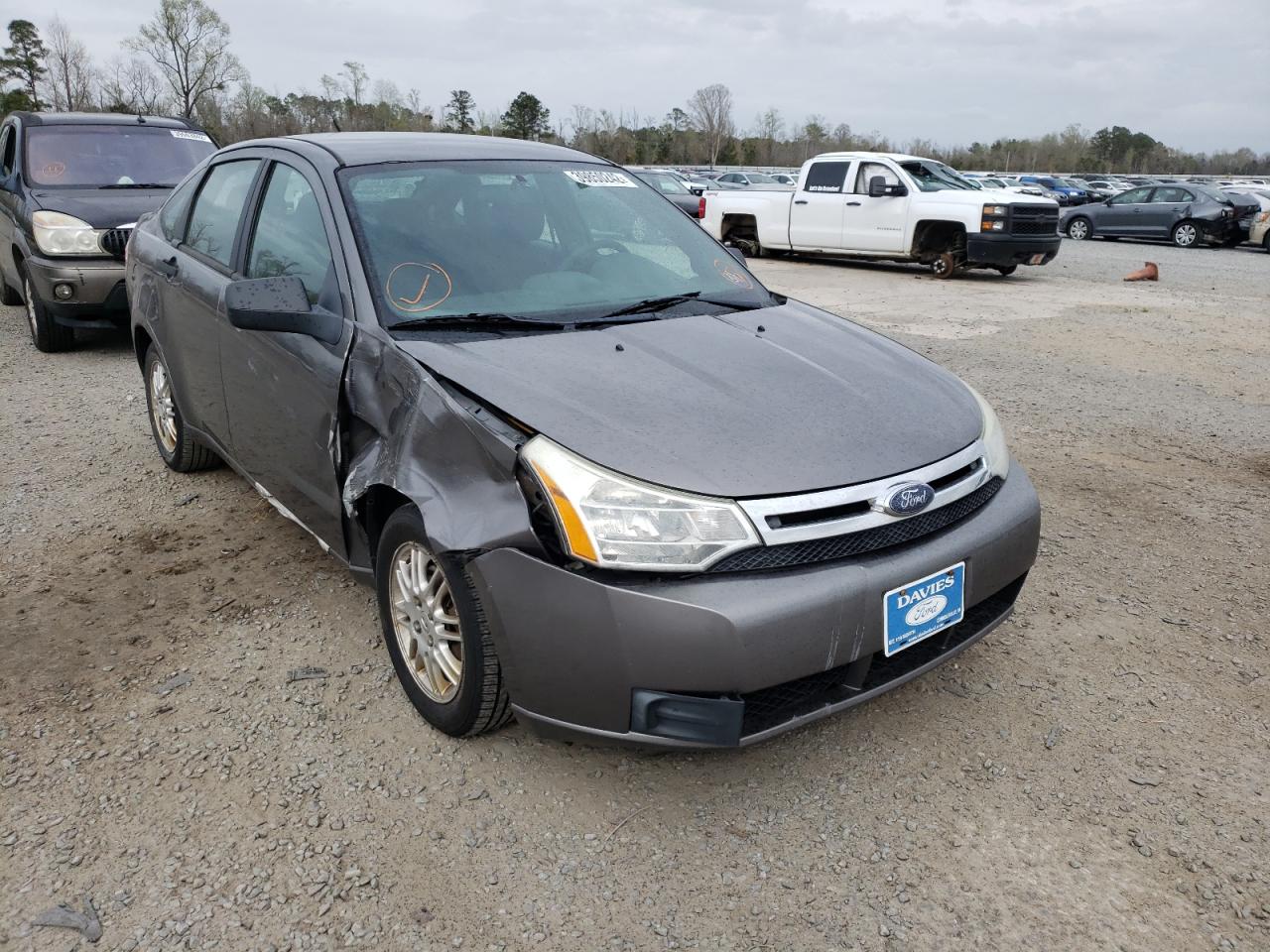 FORD FOCUS SE 2010 with VIN 1FAHP3FNXAW174116 - Photo from auction