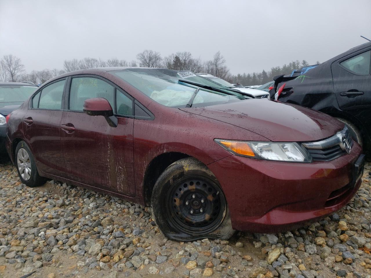 HONDA CIVIC LX 2012 with VIN 19XFB2E51CE057758 - Photo from auction