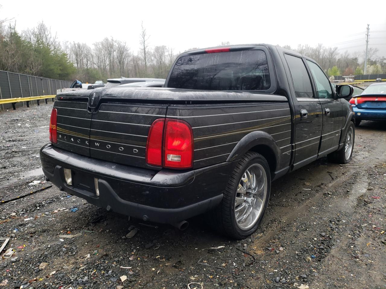 Photo 4 from auction – 2002 LINCOLN BLACKWOOD with VIN 5LTEW05A62KJ00100