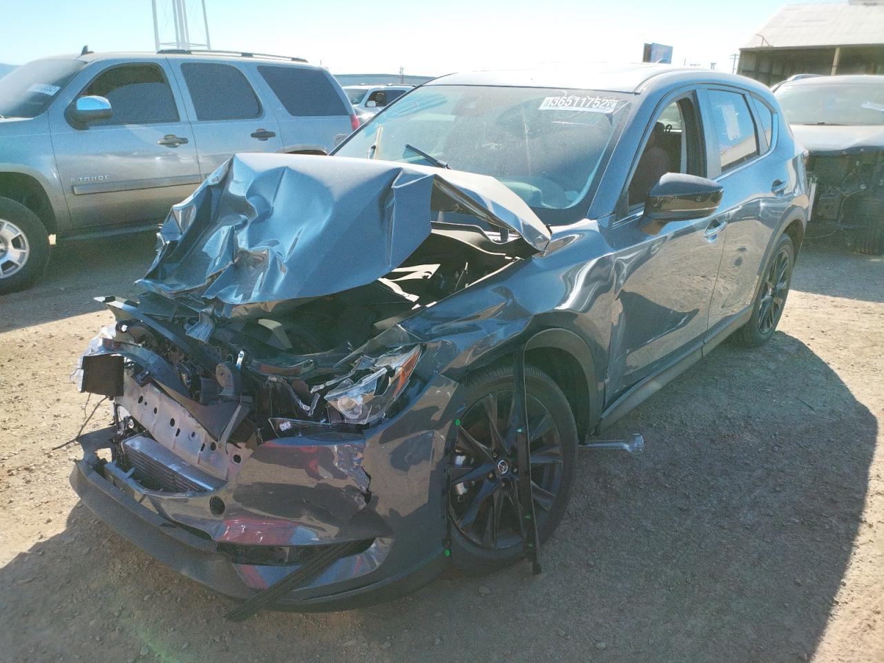 Photo 2 from auction – 2021 MAZDA CX-5 TOURI with VIN JM3KFBCY1M0438690