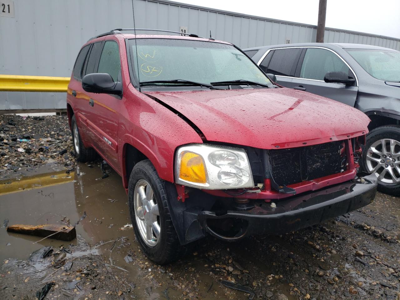 GMC ENVOY 2004 with VIN 1GKDT13S442153085 - Photo from auction