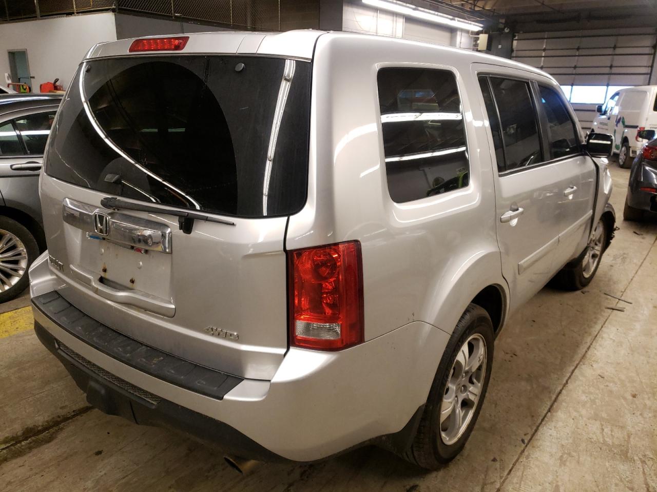 Photo 4 from auction – 2014 HONDA PILOT EXL with VIN 5FNYF4H56EB015961