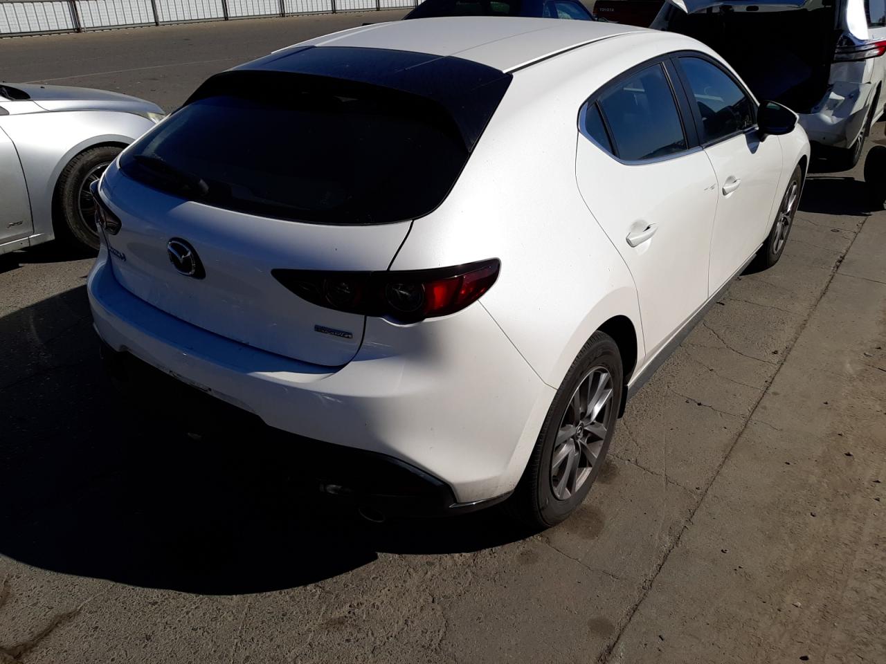 Photo 4 from auction – 2021 MAZDA 3 with VIN JM1BPAJL6M1309250