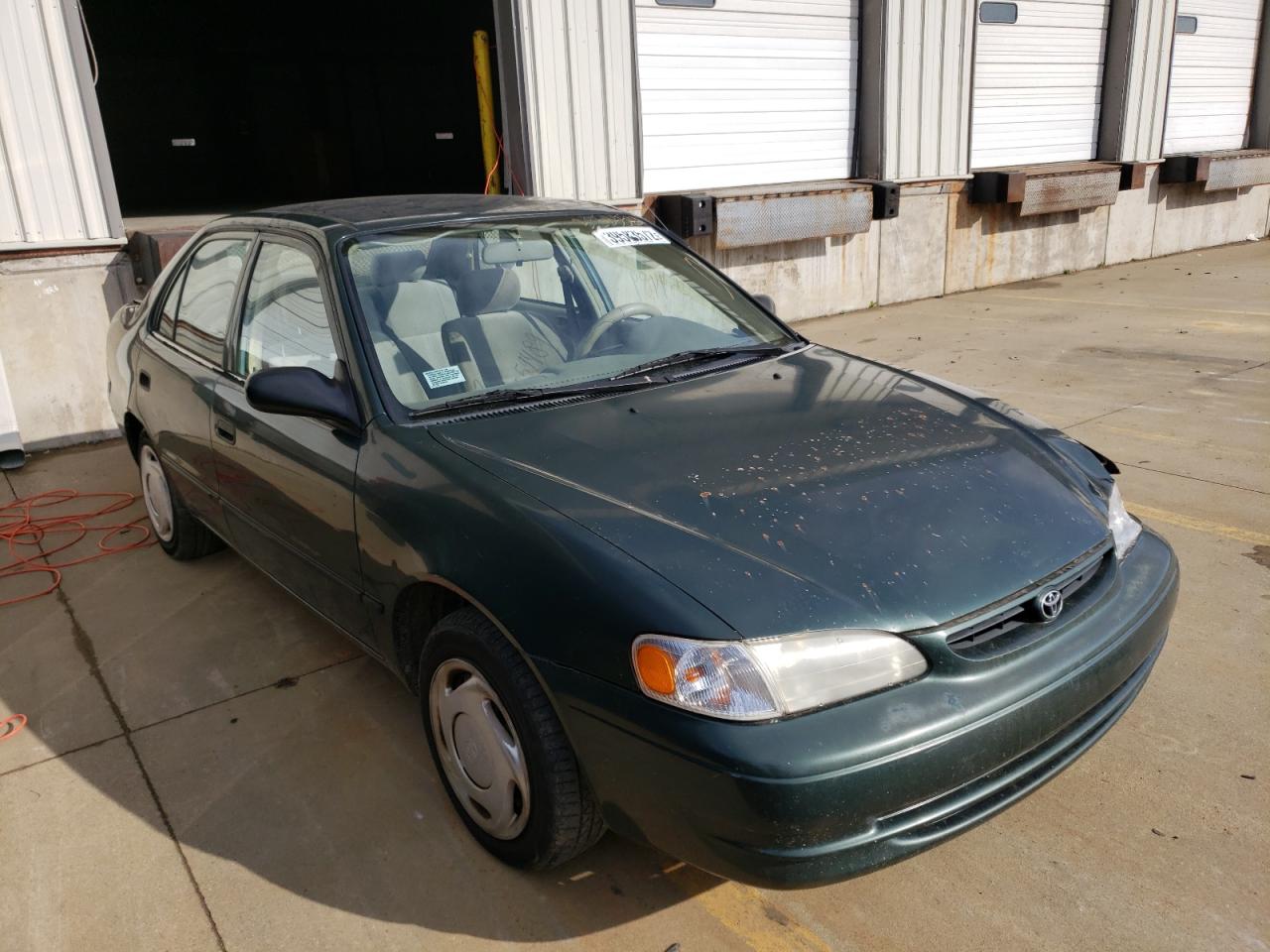 TOYOTA COROLLA VE 2000 with VIN 2T1BR12E6YC299721 - Photo from auction