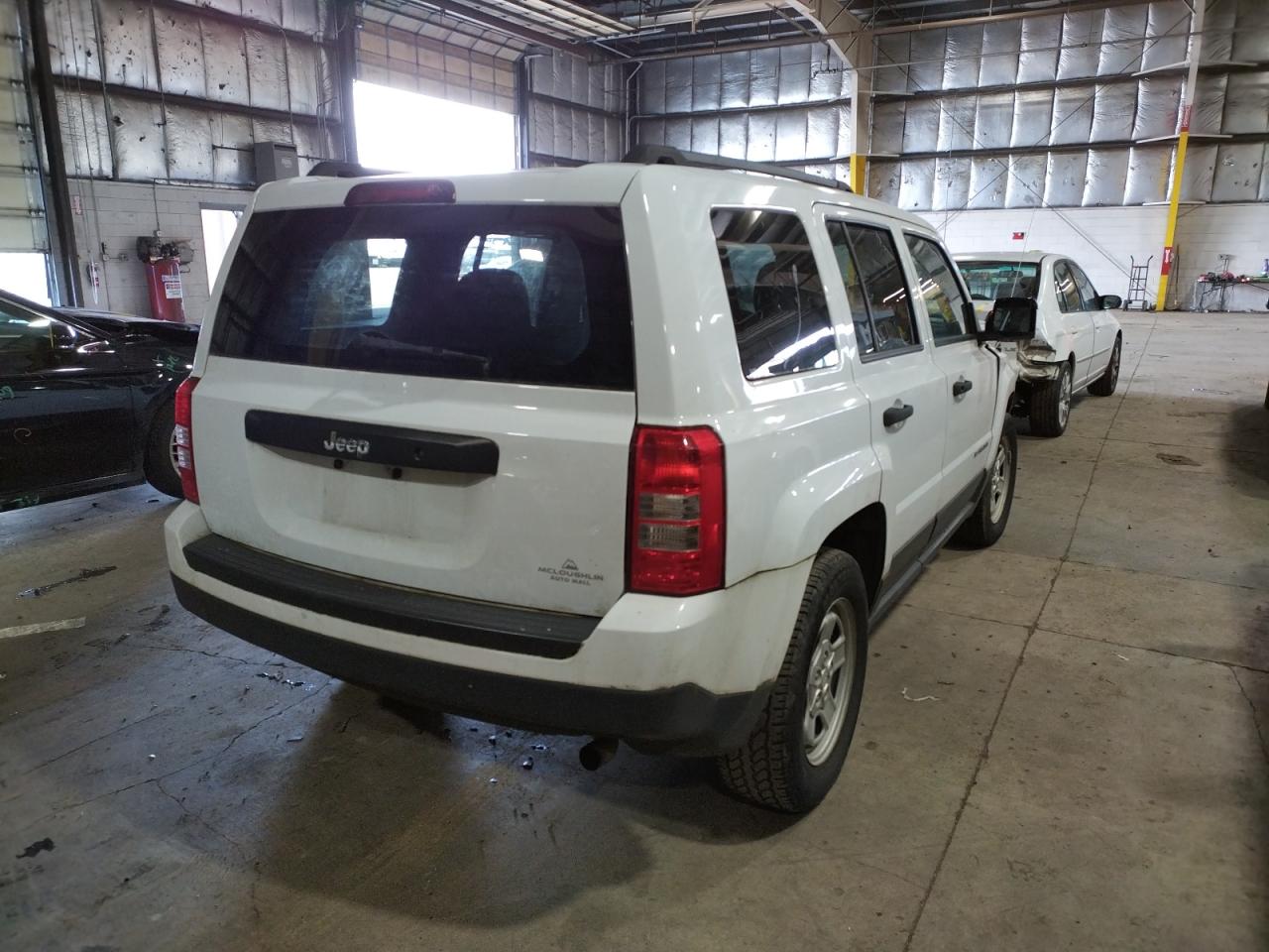 Photo 4 from auction – 2014 JEEP PATRIOT SP with VIN 1C4NJPBA2ED911478