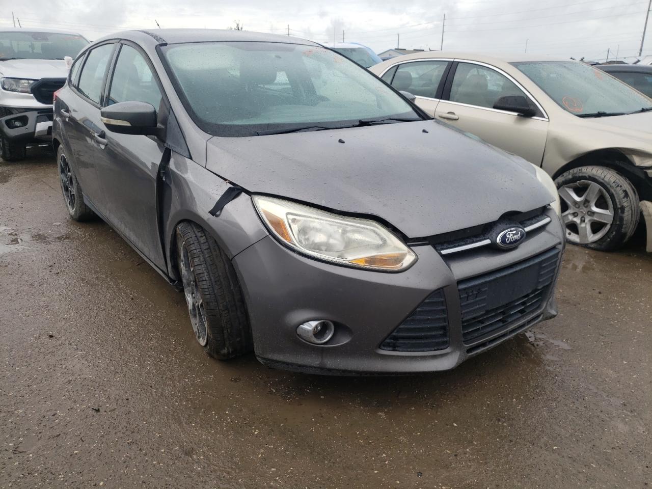 FORD FOCUS SE 2014 with VIN 1FADP3K20EL173123 - Photo from auction