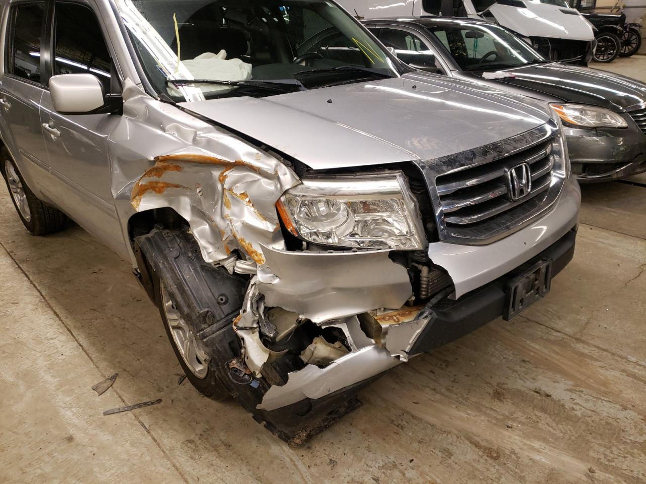 Photo 9 from auction – 2014 HONDA PILOT EXL with VIN 5FNYF4H56EB015961