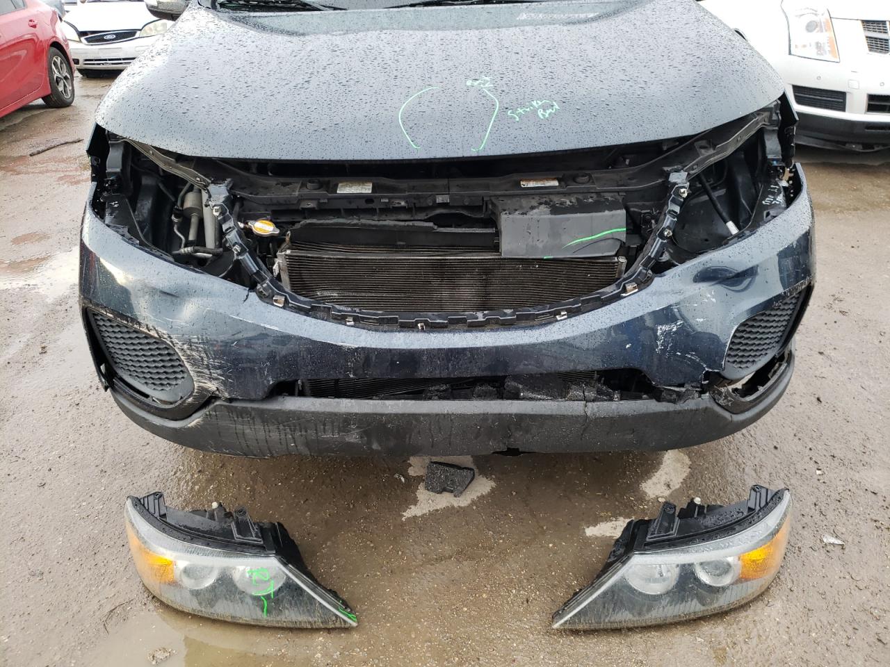 Photo 9 from auction – 2013 KIA SORENTO LX with VIN 5XYKT3A17DG339914