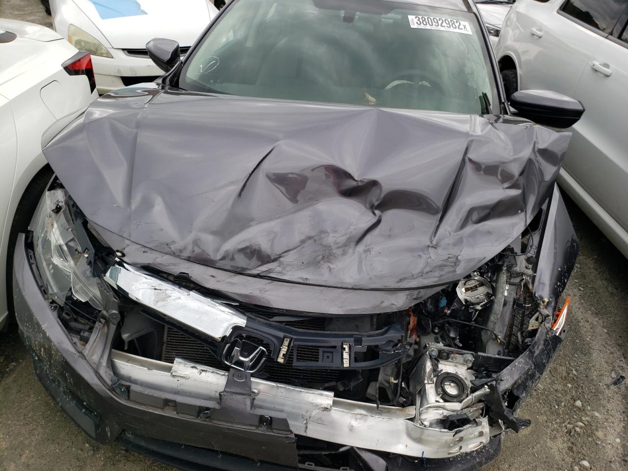 Photo 7 from auction – 2017 HONDA CIVIC LX with VIN 19XFC2F58HE073796