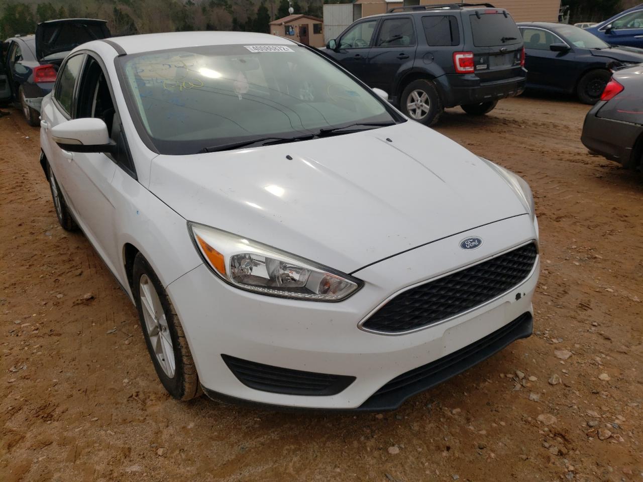 FORD FOCUS SE 2017 with VIN 1FADP3F26HL231864 - Photo from auction