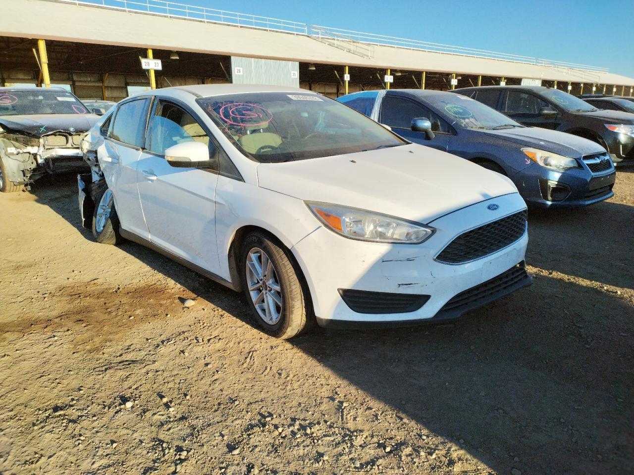FORD FOCUS SE 2016 with VIN 1FADP3F2XGL273856 - Photo from auction
