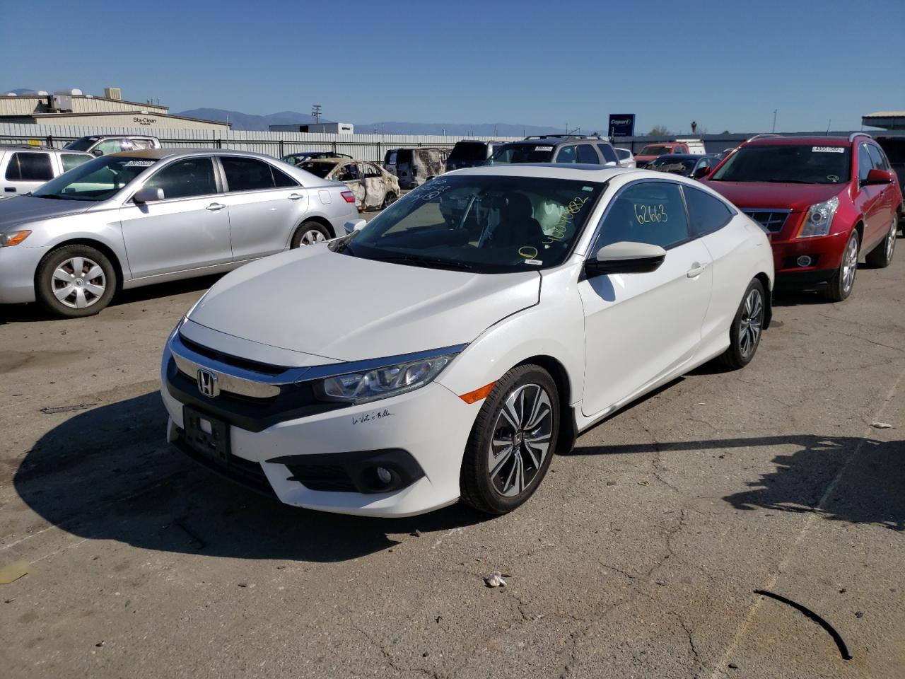 Photo 2 from auction – 2016 HONDA CIVIC EX with VIN 2HGFC3B33GH361014