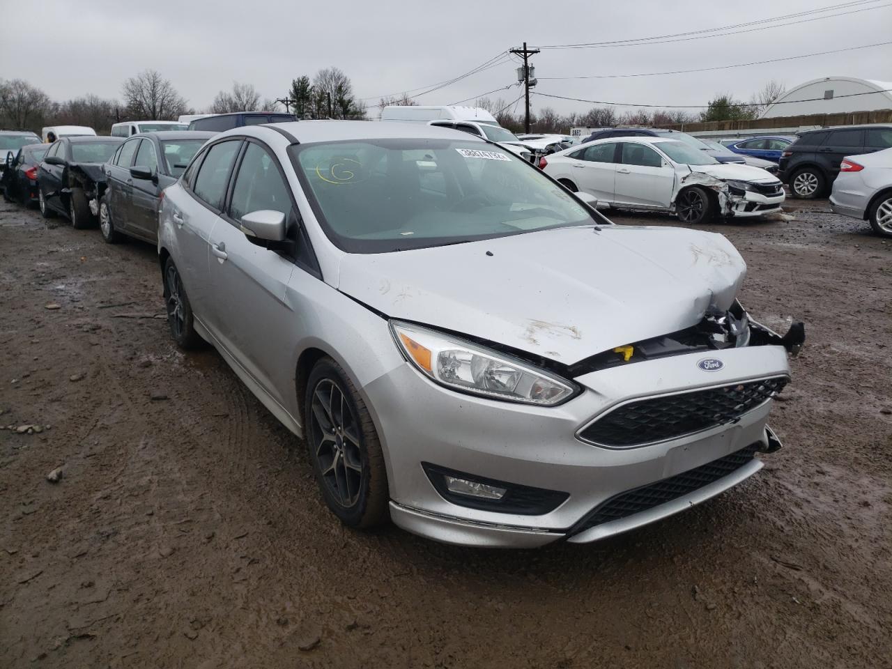 FORD FOCUS SE 2016 with VIN 1FADP3F24GL400987 - Photo from auction