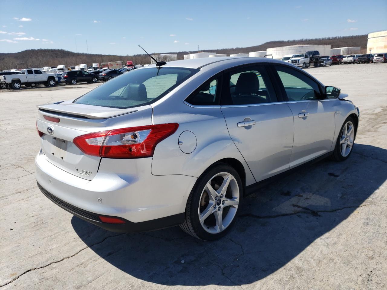 Photo 4 from auction – 2013 FORD FOCUS TITA with VIN 1FADP3J20DL313249