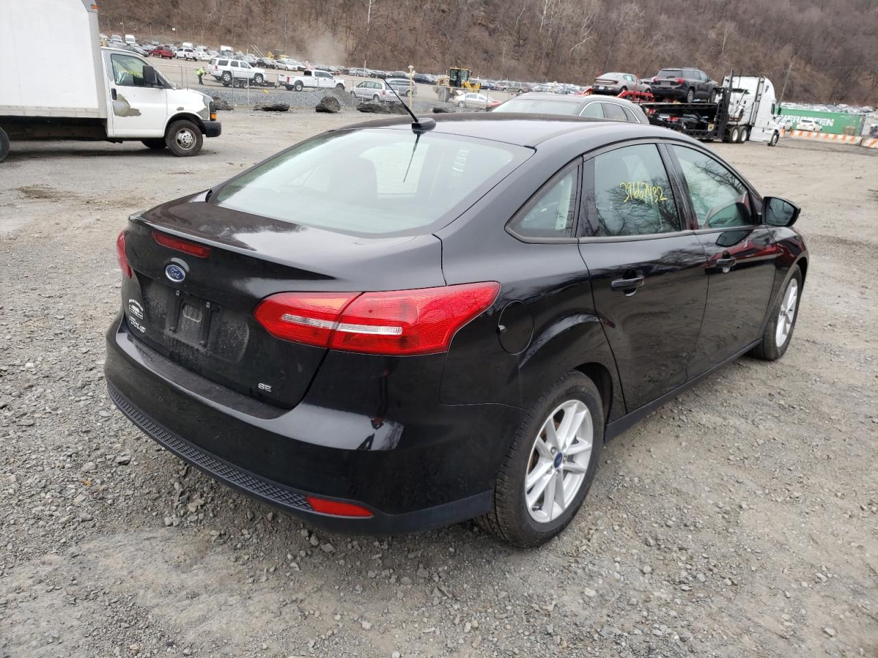 Photo 4 from auction – 2017 FORD FOCUS SE with VIN 1FADP3F20HL335783
