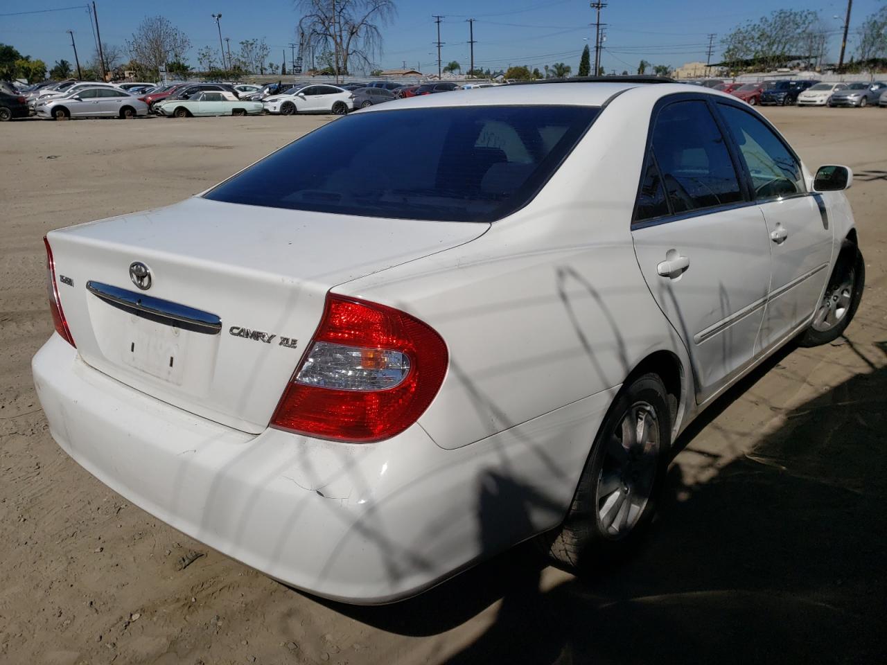 Photo 4 from auction – 2004 TOYOTA CAMRY LE with VIN 4T1BE32K04U314204