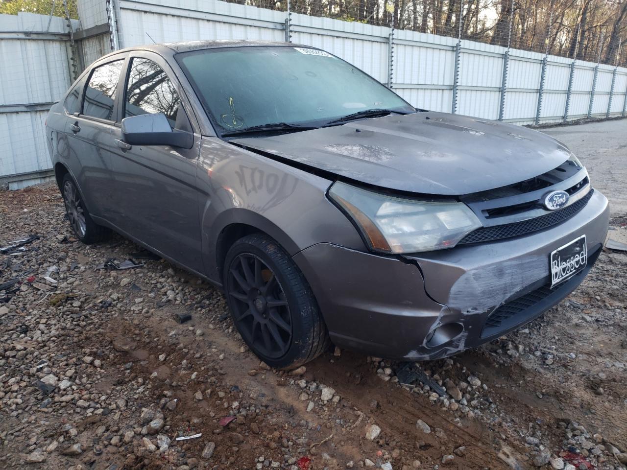 FORD FOCUS SES 2011 with VIN 1FAHP3GN1BW181083 - Photo from auction