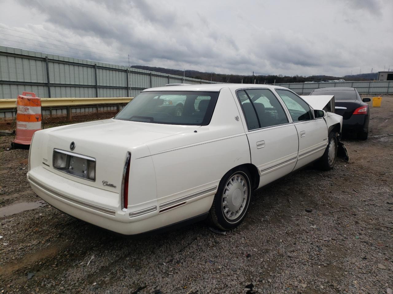 Photo 4 from auction – 1997 CADILLAC DEVILLE with VIN 1G6KD54Y4VU295357