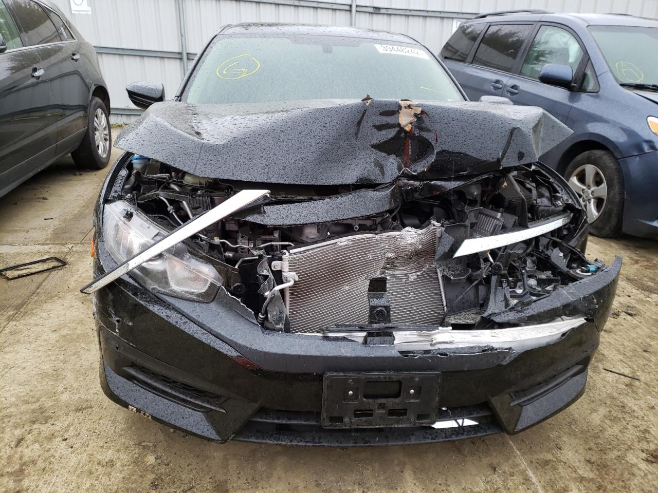 Photo 9 from auction – 2017 HONDA CIVIC LX with VIN 2HGFC2F56HH549534