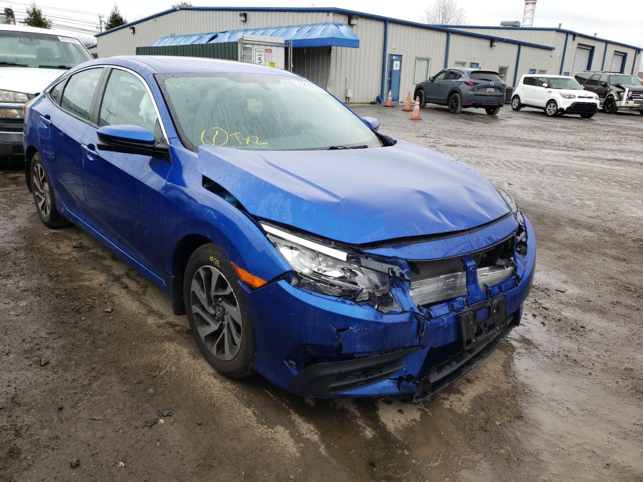 HONDA CIVIC EX 2017 with VIN 19XFC2F72HE208322 - Photo from auction
