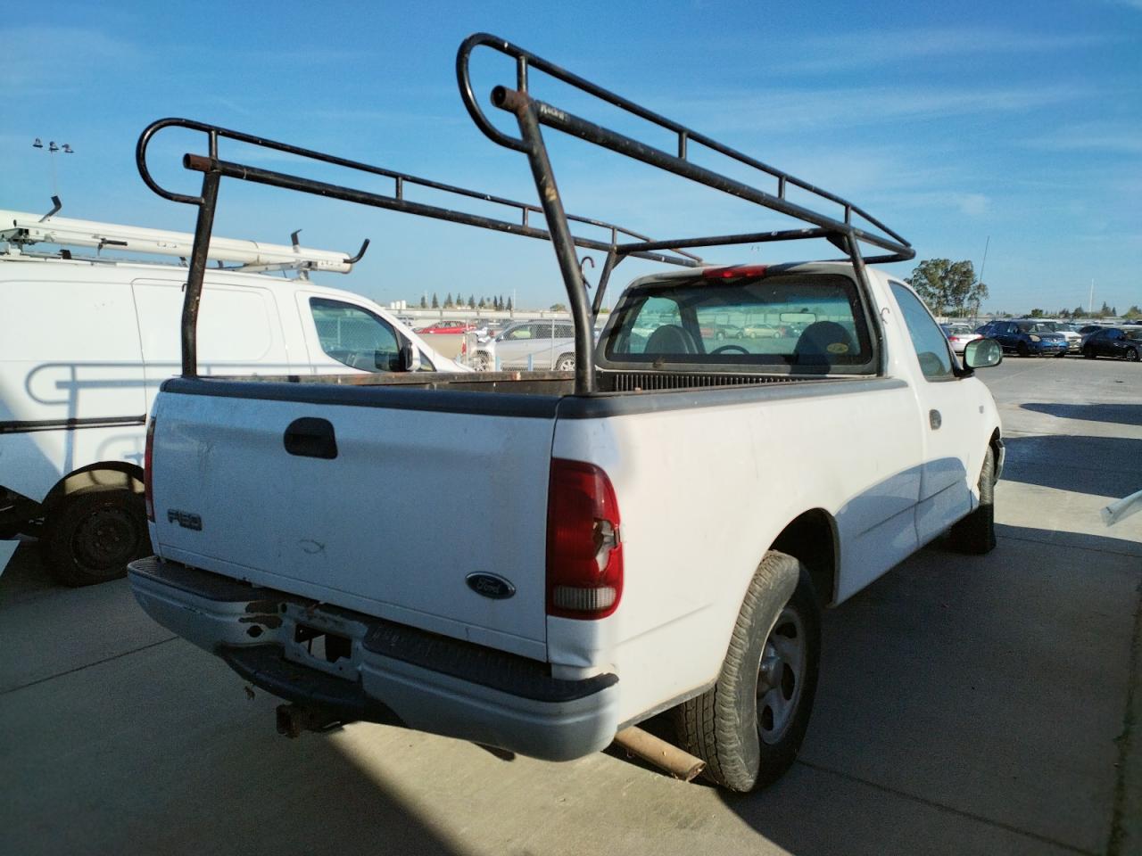 Photo 4 from auction – 1999 FORD F150 with VIN 1FTZF1724XNA06352