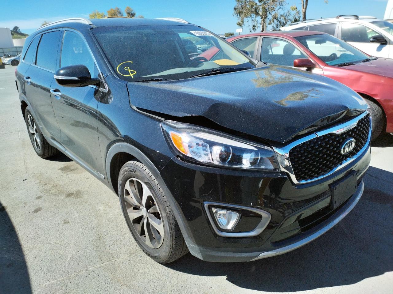 KIA SORENTO EX 2016 with VIN 5XYPHDA57GG001840 - Photo from auction