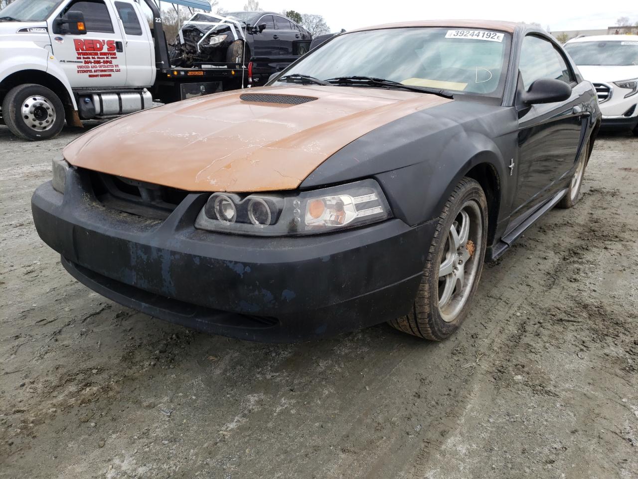 Photo 2 from auction – 2000 FORD MUSTANG with VIN 1FAFP4043YF252033