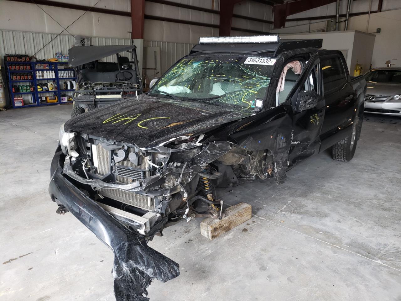 Photo 2 from auction – 2015 TOYOTA TACOMA DOU with VIN 3TMLU4ENXFM166996
